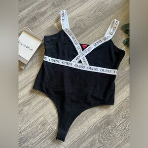 Guess black bodysuit with contrasting white logo straps and keyhole cutout sz L